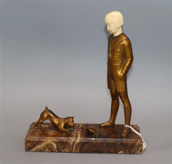 Andre Becquerel (1893-1981). A gilt bronze and ivory group of a boy watching a terrier with a crab, height 24cm